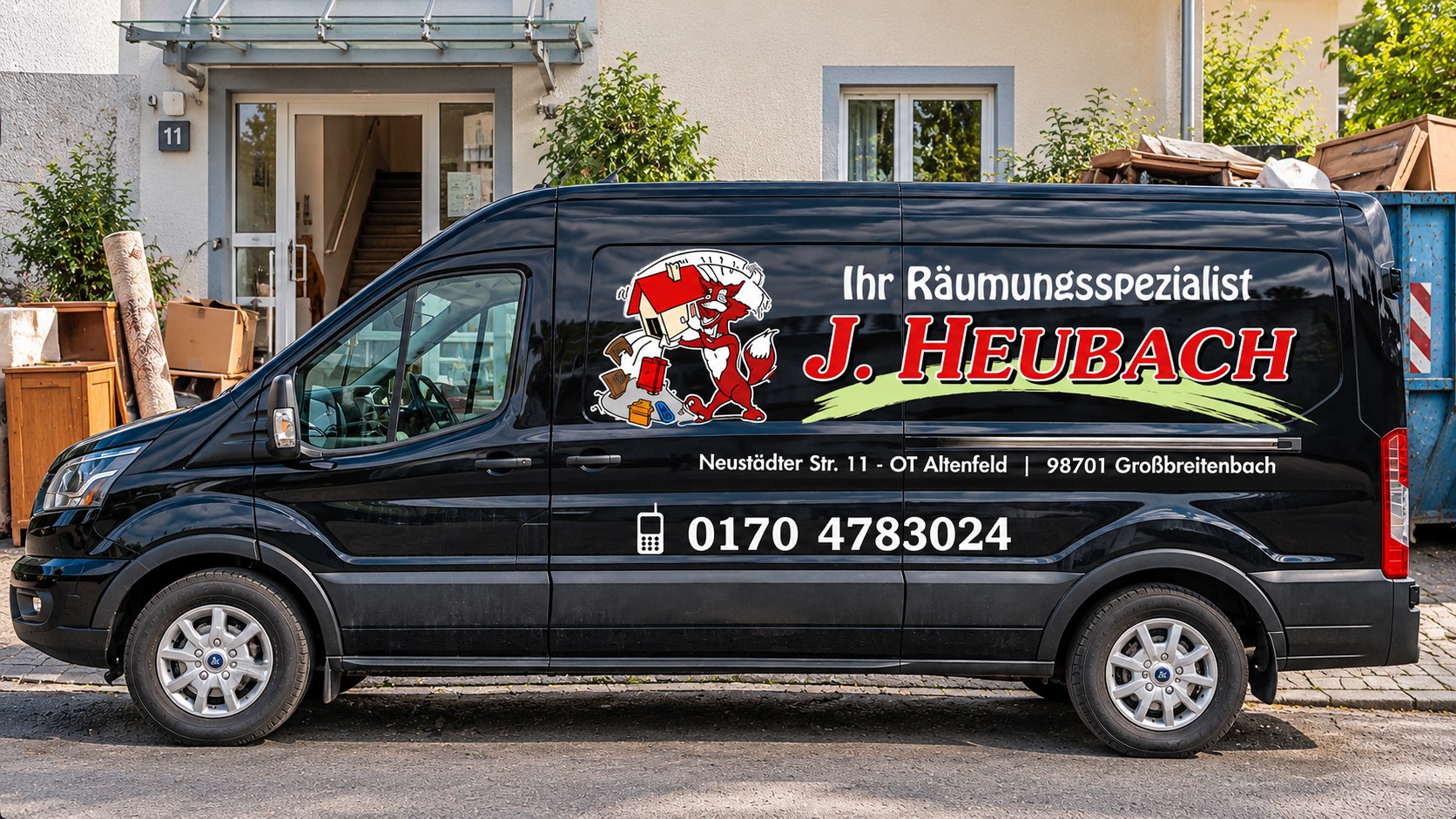 Firmentransporter J. Heubach vor einem Wohnhaus